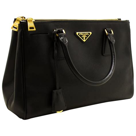 prada black luxe saffiano golden clasp bag|prada lux bag review.